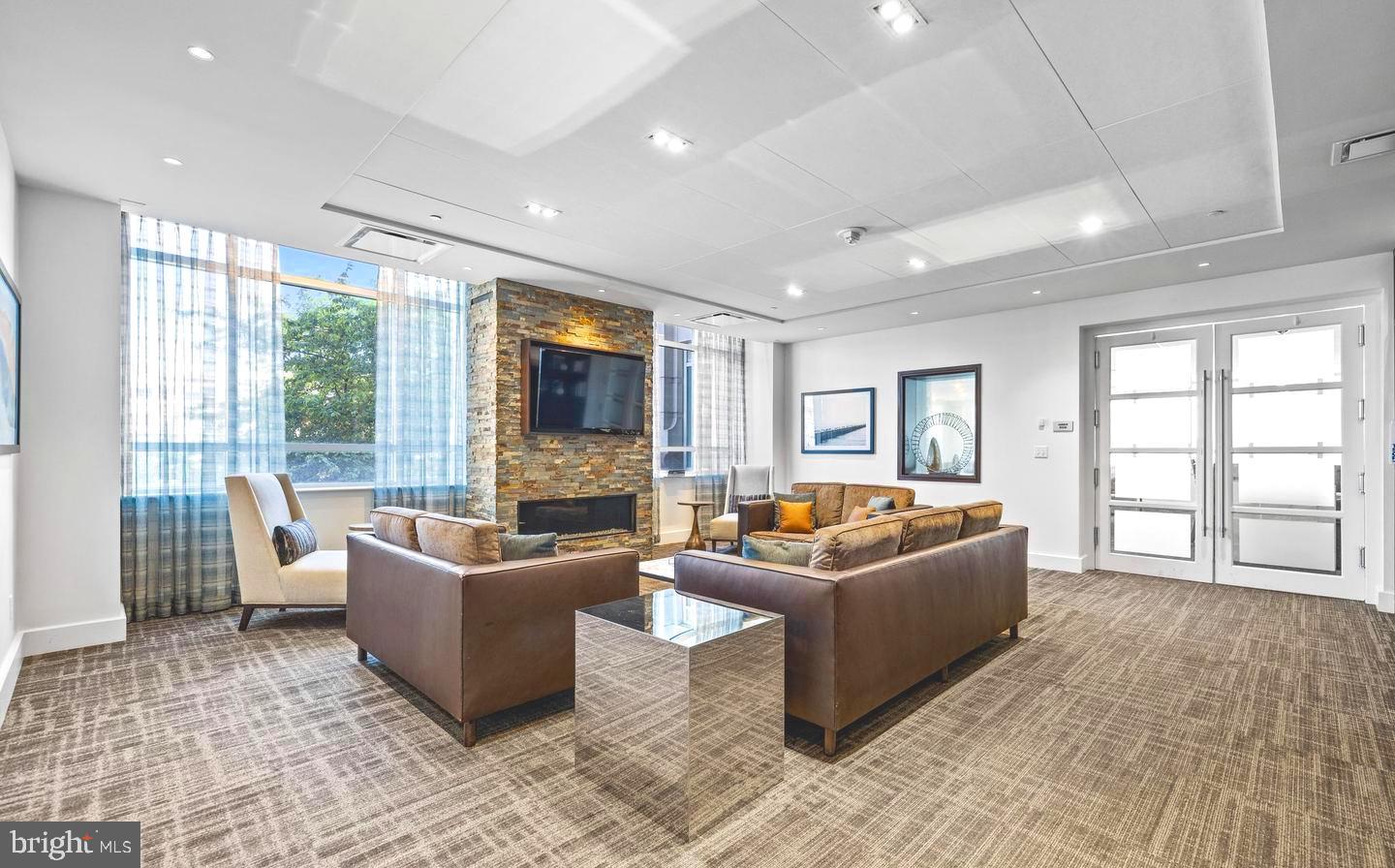 100 Harborview Drive, Unit 1106 Baltimore, MD 21230 - Photo 50 of 55 Lounge with Fireplace