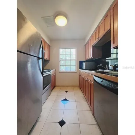 a bathroom with a bathtub and a toilet