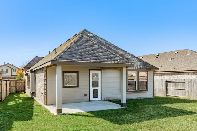 a backyard of a house with lots of green space