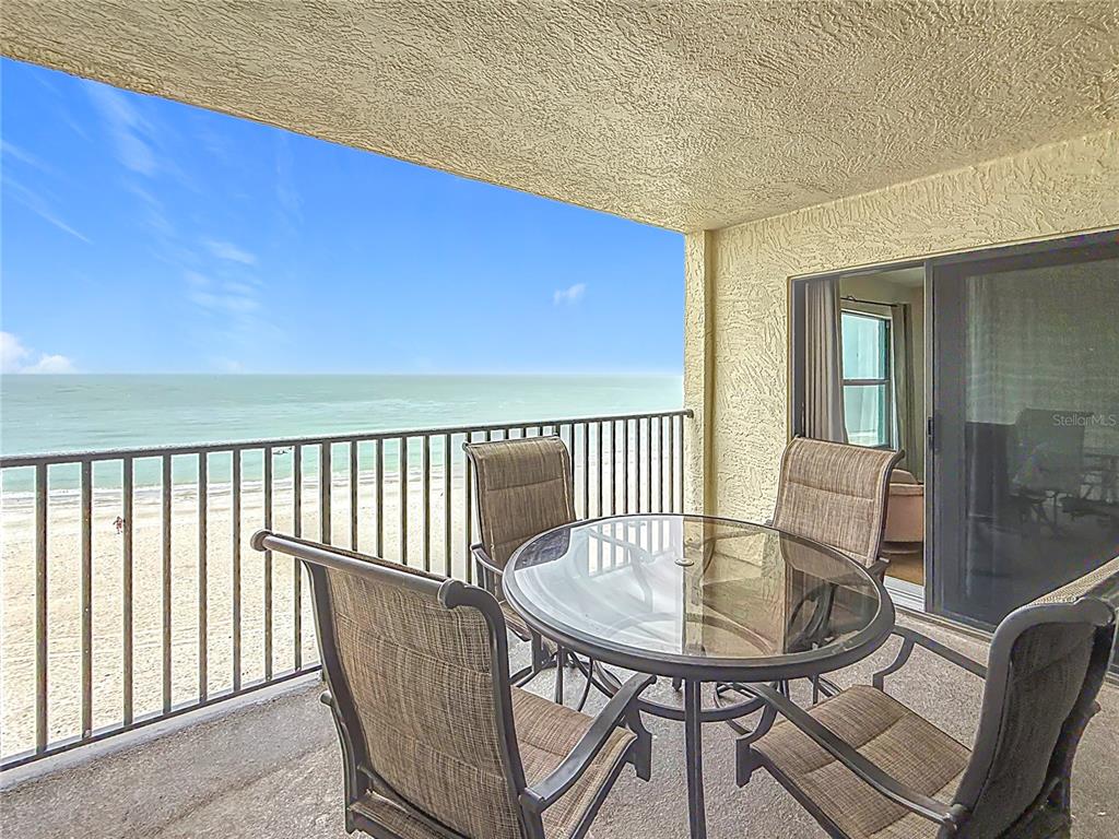 12924 Gulf Boulevard, Unit 503 Madeira Beach, FL 33708 - Photo 1 of 1 a view of a dining room with furniture and window