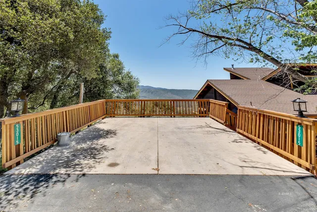 a kitchen with stainless steel appliances granite countertop a stove and cabinets
