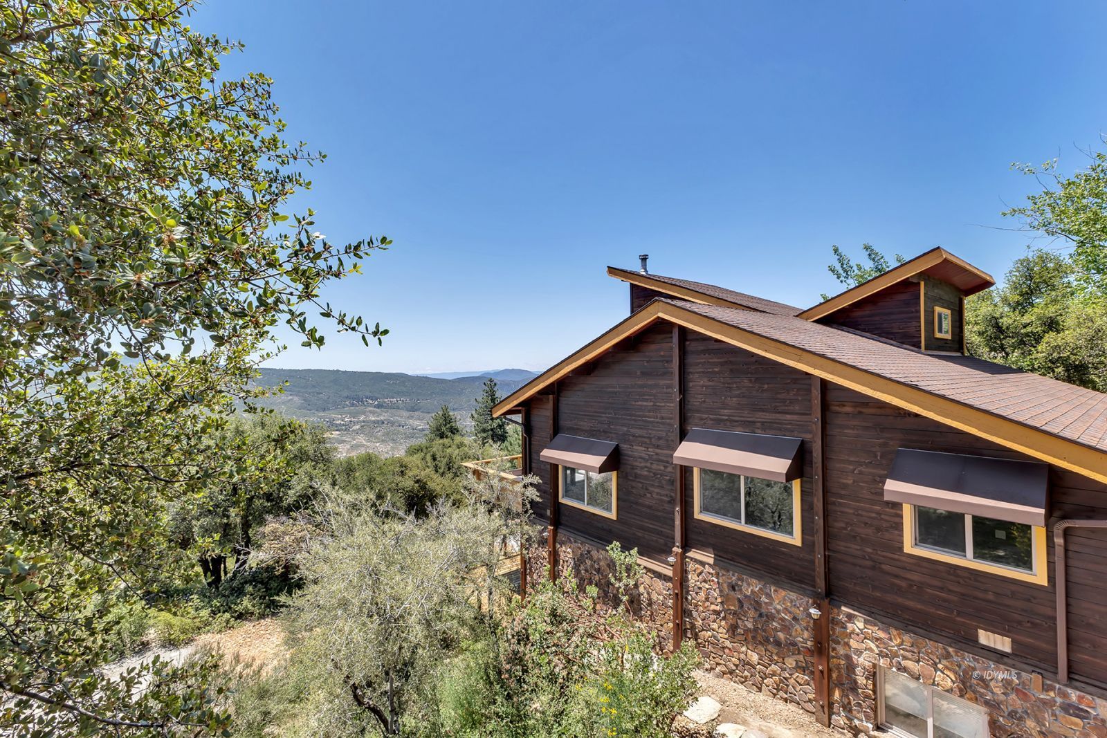 53015 Double View Drive Idyllwild, CA 92549 - Photo 17 of 99 a backyard of a house with lots of green space