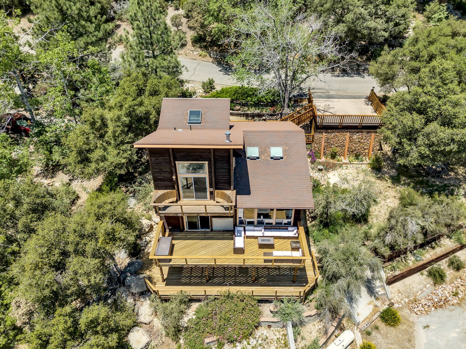 53015 Double View Drive Idyllwild, CA 92549 - Photo 2 of 99 an aerial view of a house with swimming pool and porch