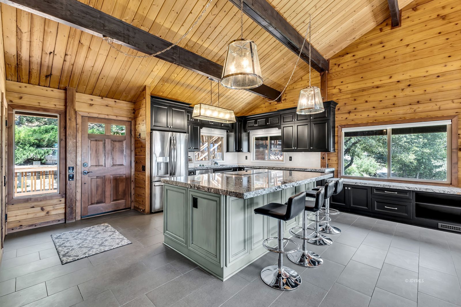 53015 Double View Drive Idyllwild, CA 92549 - Photo 27 of 99 a dinning table and chairs in the patio
