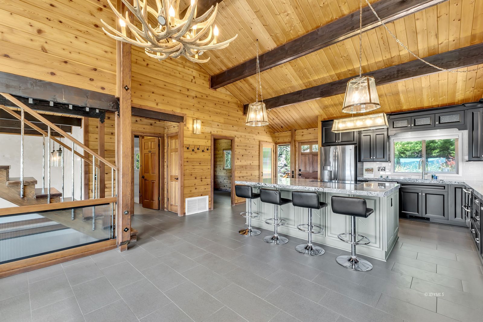 53015 Double View Drive Idyllwild, CA 92549 - Photo 29 of 99 a view of a patio with dining table and chairs
