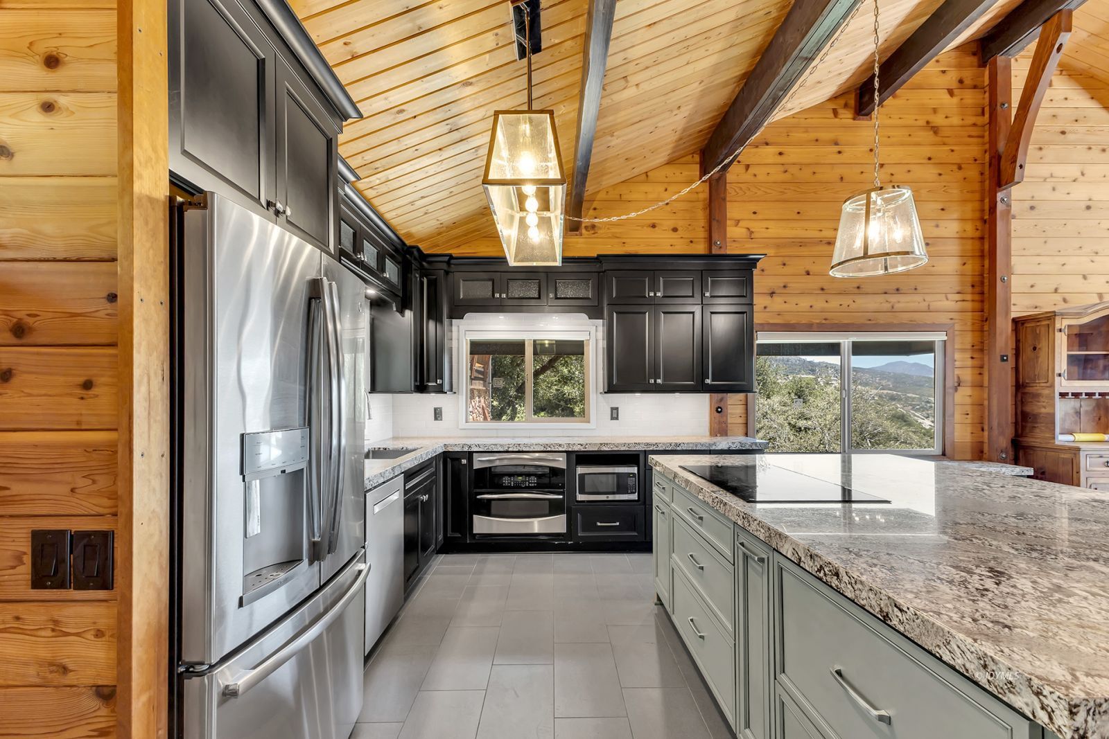 53015 Double View Drive Idyllwild, CA 92549 - Photo 33 of 99 a kitchen with stainless steel appliances granite countertop a sink and a refrigerator