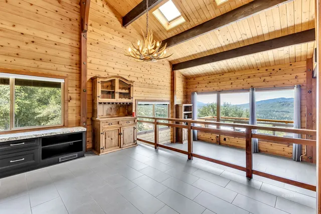 a view of a living room with a rug