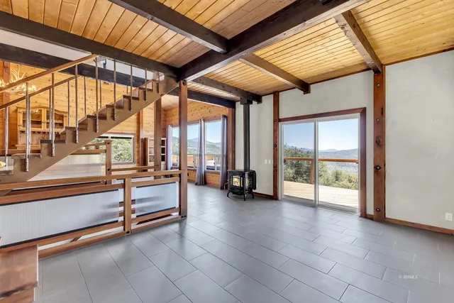 a kitchen with stainless steel appliances granite countertop a stove and a refrigerator