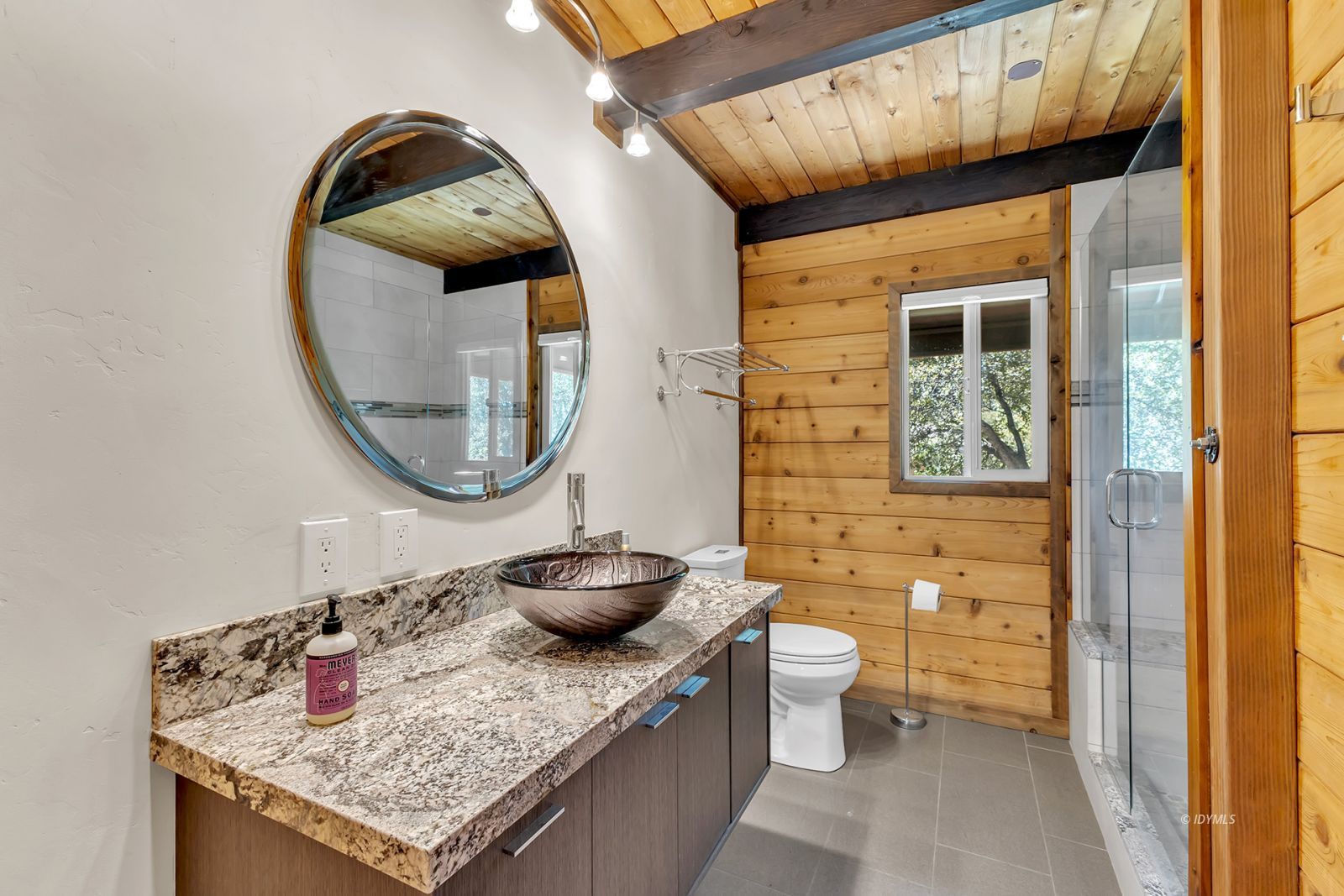 53015 Double View Drive Idyllwild, CA 92549 - Photo 51 of 99 a bathroom with a granite countertop sink and a mirror