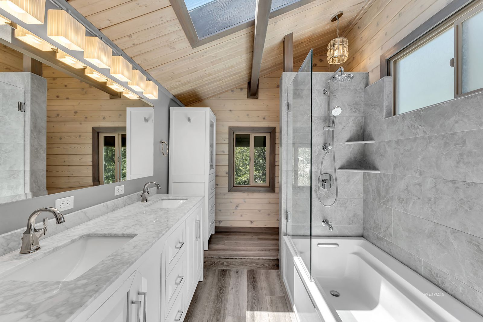 53015 Double View Drive Idyllwild, CA 92549 - Photo 59 of 99 a bathroom with a granite countertop sink mirror bathtub and shower