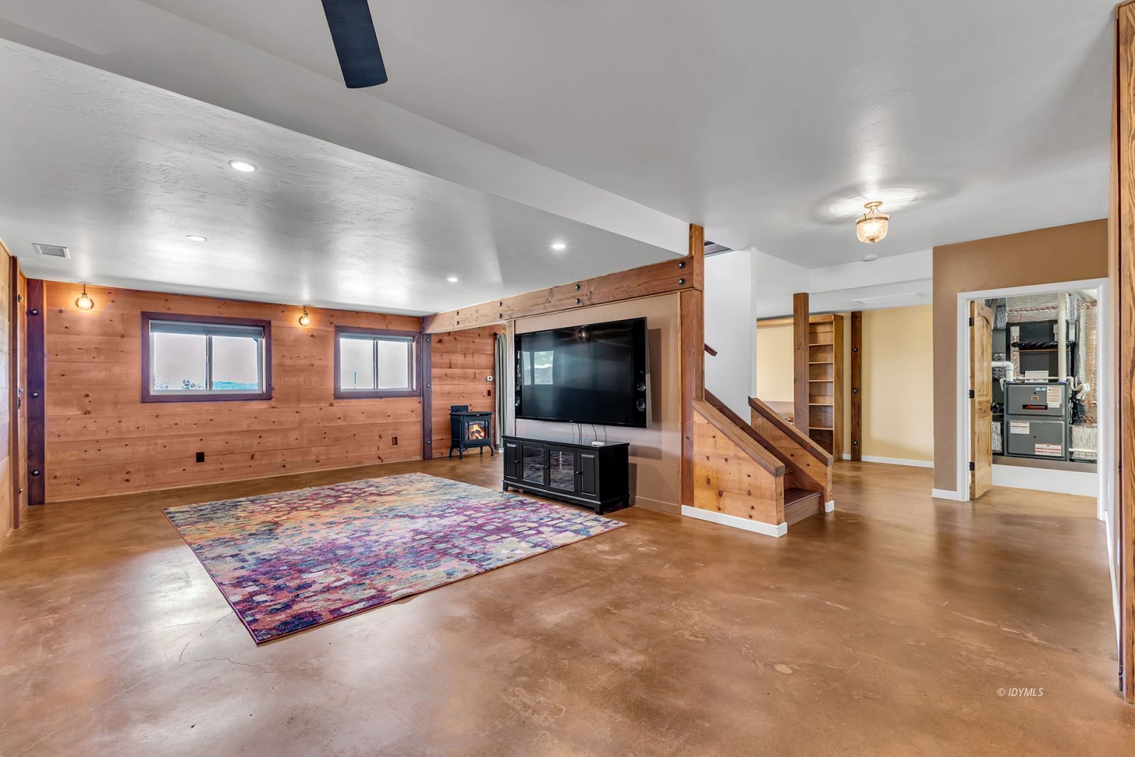 53015 Double View Drive Idyllwild, CA 92549 - Photo 72 of 99 a living room with furniture and a flat screen tv
