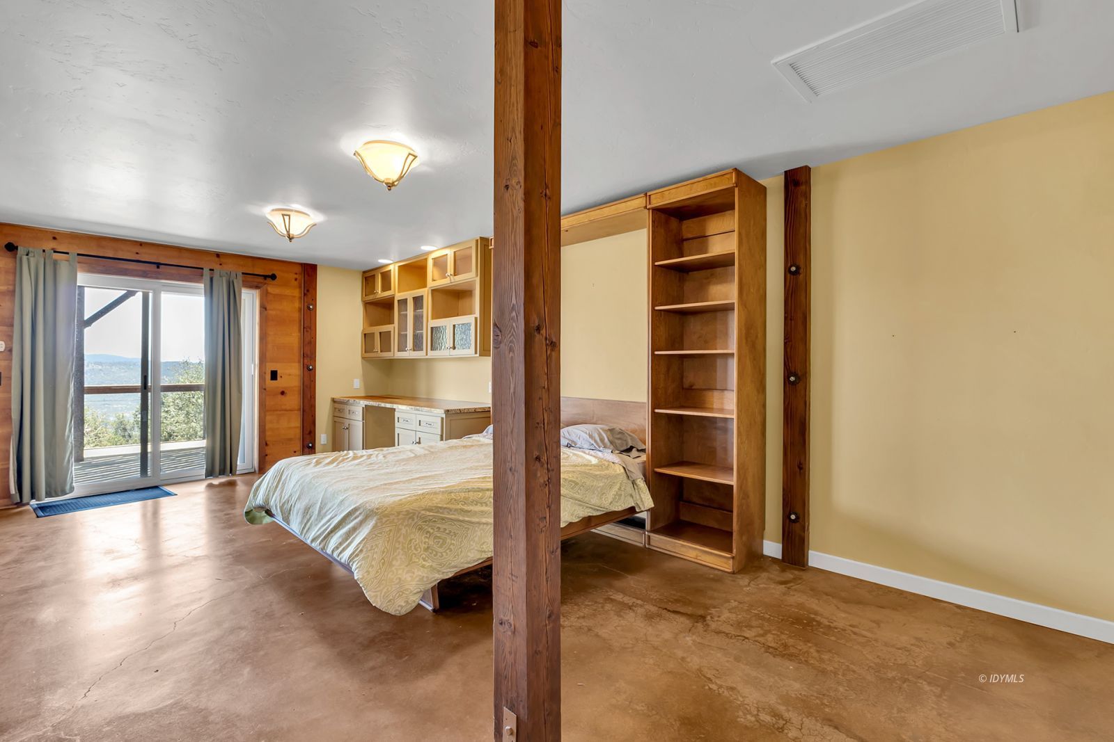 53015 Double View Drive Idyllwild, CA 92549 - Photo 78 of 99 a bedroom with a bed and a large window