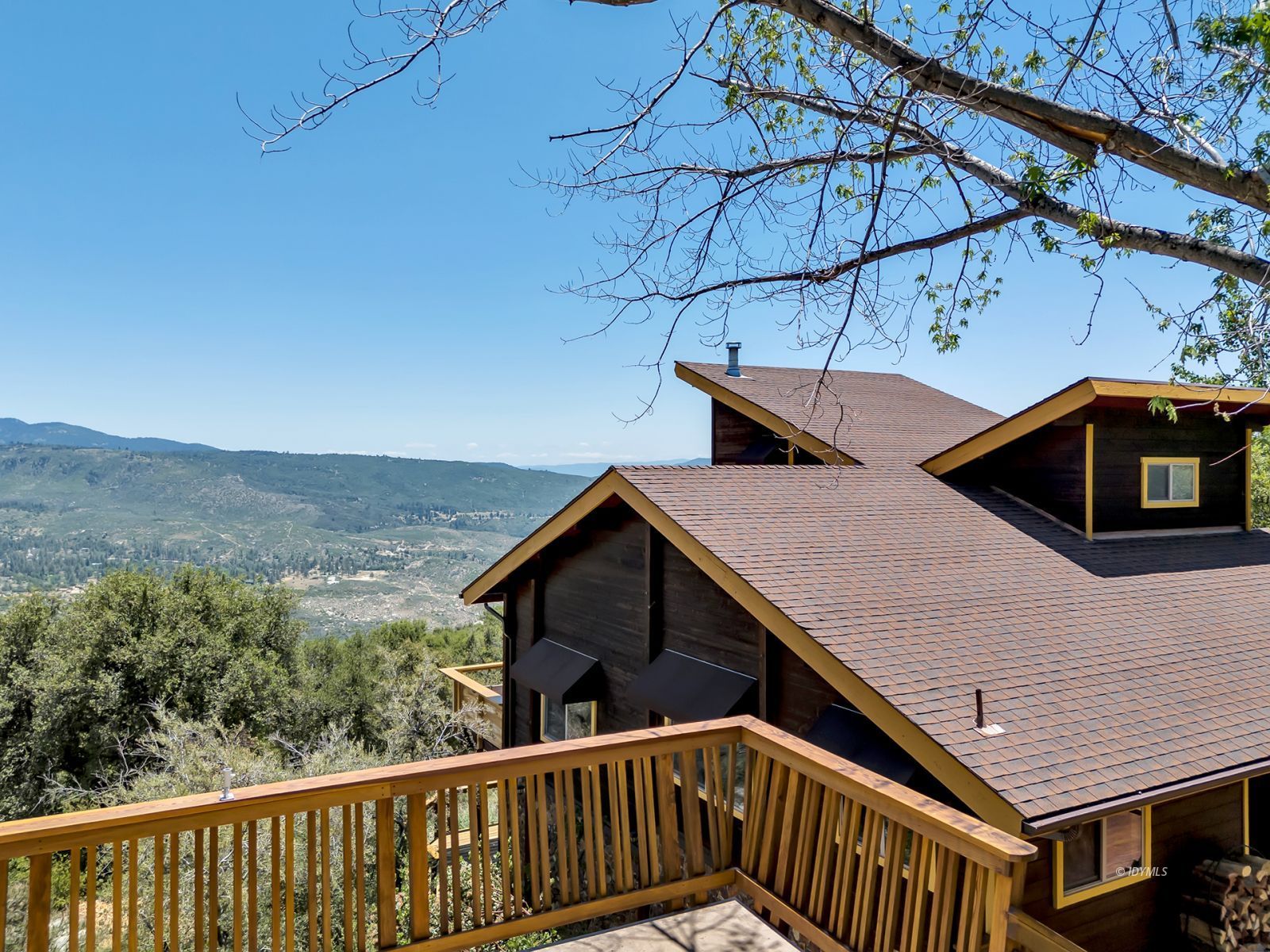 53015 Double View Drive Idyllwild, CA 92549 - Photo 10 of 99 a view of a roof deck with wooden fence and floor