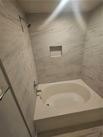 a bathroom with a bathtub