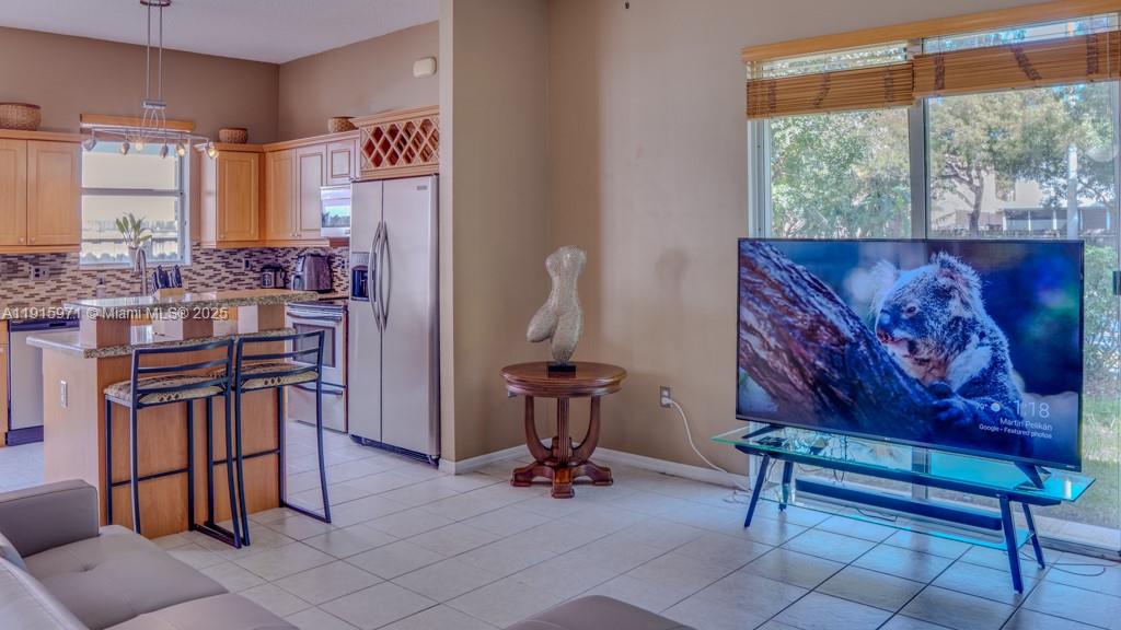 1701 Southeast 17th Avenue Homestead, FL 33035 - Photo 7 of 25 a dining room with furniture and wooden floor