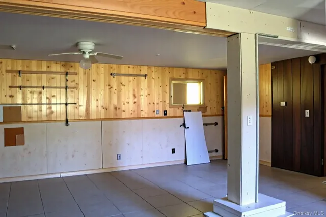 a view of a bathroom with a sink and mirror