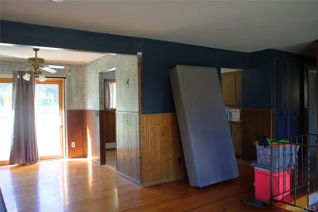 wooden floor in a hall with an entryway and wooden floor