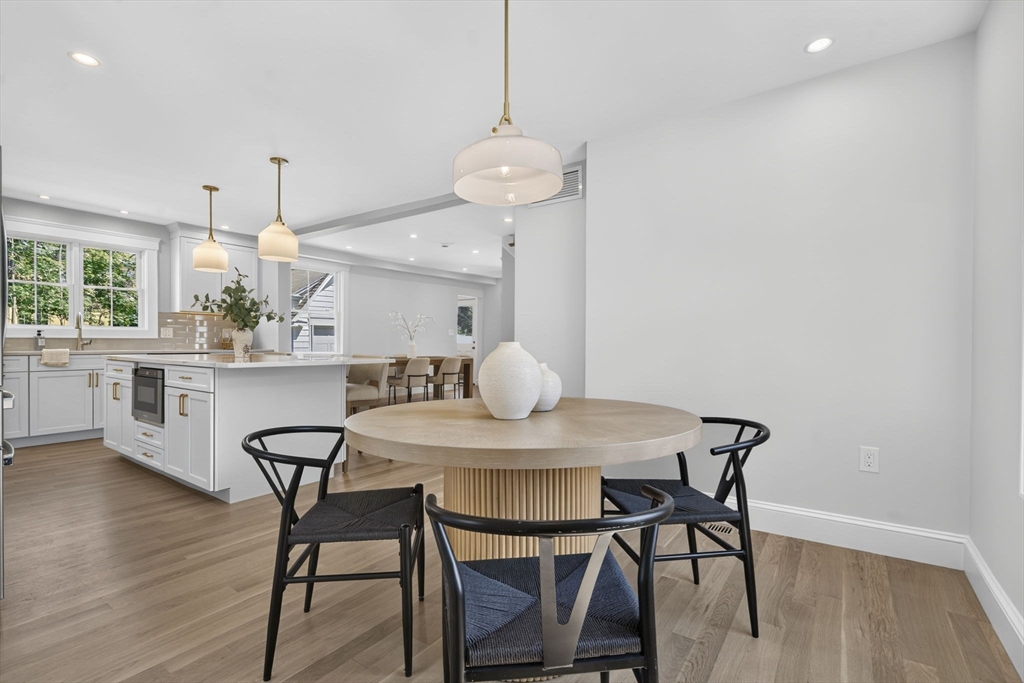 20 Saltonstall Road Medford, MA 02155 - Photo 15 of 41 a view of a dining room with furniture and wooden floor