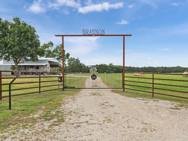 a view of outdoor space with deck and yard
