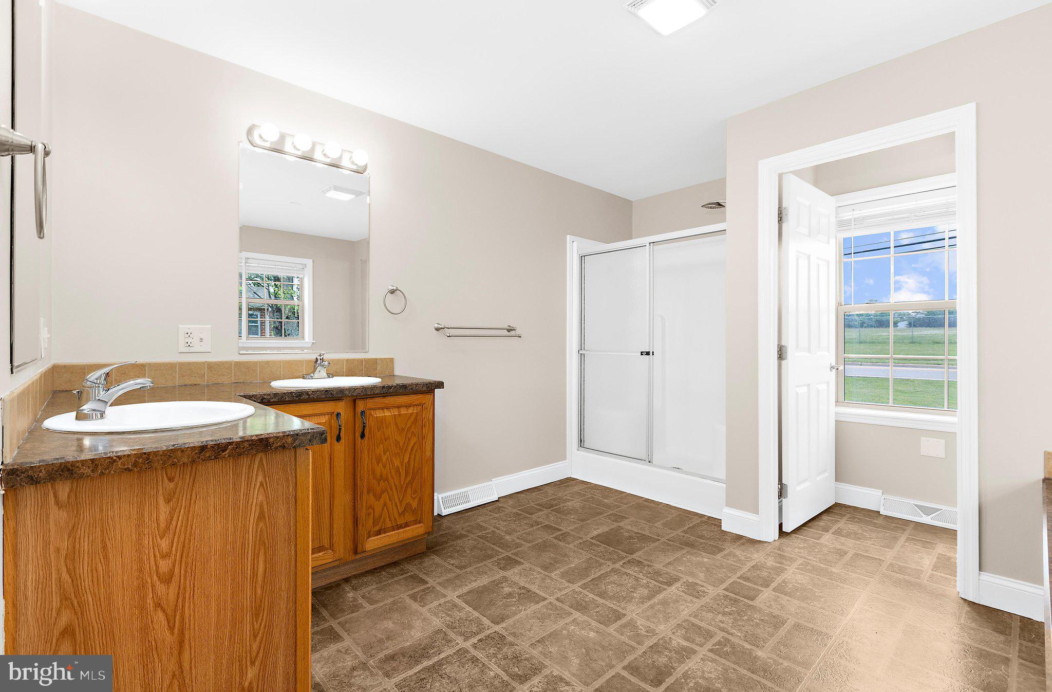 7214 Dogwood Road Windsor Mill, MD 21244 - Photo 29 of 57 Primary Bathroom