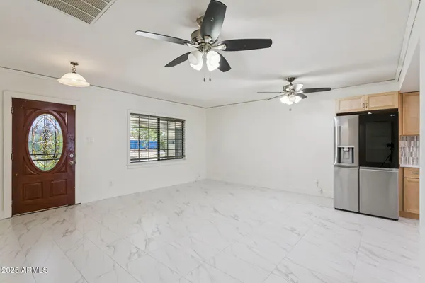 a kitchen with stainless steel appliances a stove sink and cabinets