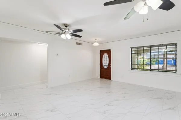 a kitchen with a sink a stove and refrigerator