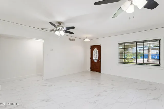 a kitchen with a sink a stove and refrigerator