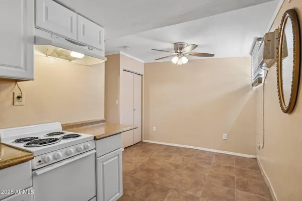 a kitchen with stainless steel appliances a refrigerator sink and stove