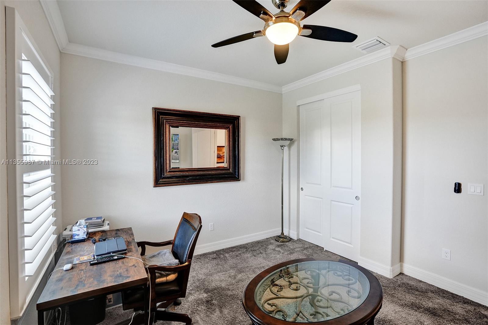 5055 Eucalyptus Drive Hollywood, FL 33021 - Photo 16 of 50 a workspace with furniture and window