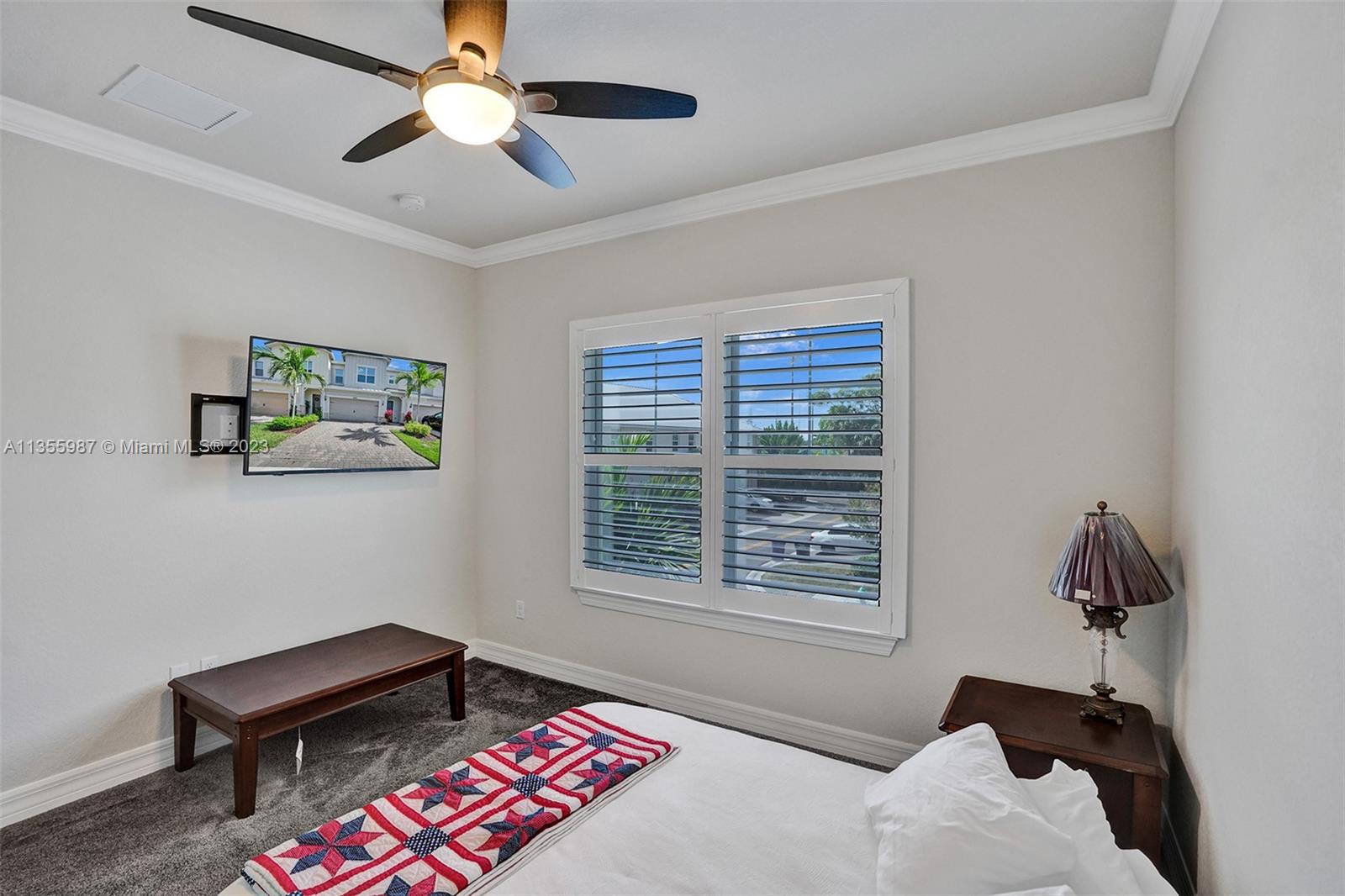 5055 Eucalyptus Drive Hollywood, FL 33021 - Photo 31 of 50 a bedroom with a bed and a window