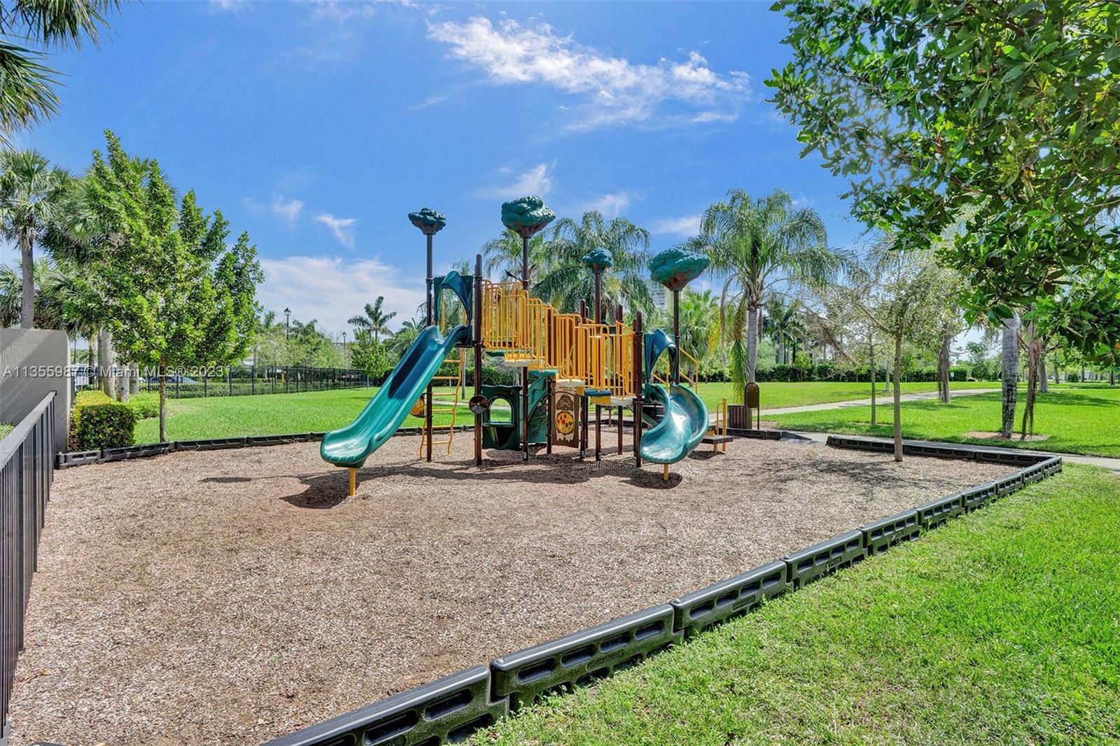 5055 Eucalyptus Drive Hollywood, FL 33021 - Photo 44 of 50 a view of outdoor space with playground and green space