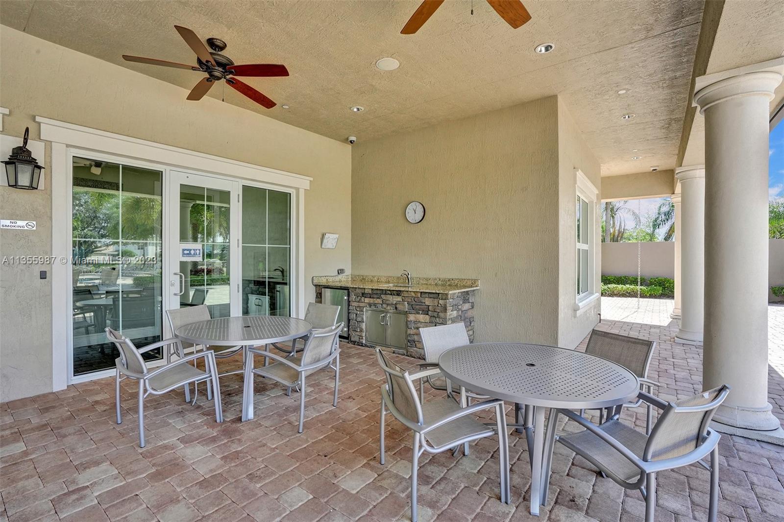 5055 Eucalyptus Drive Hollywood, FL 33021 - Photo 48 of 50 a view of a dining room with furniture window and outside view