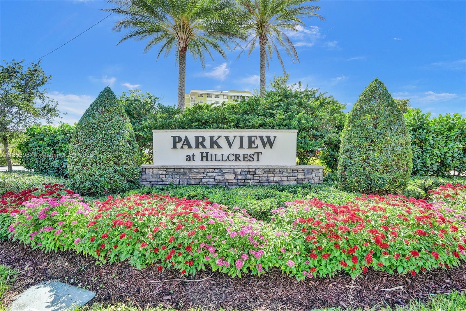 5055 Eucalyptus Drive Hollywood, FL 33021 - Photo 49 of 50 a sign that is in front of flowers