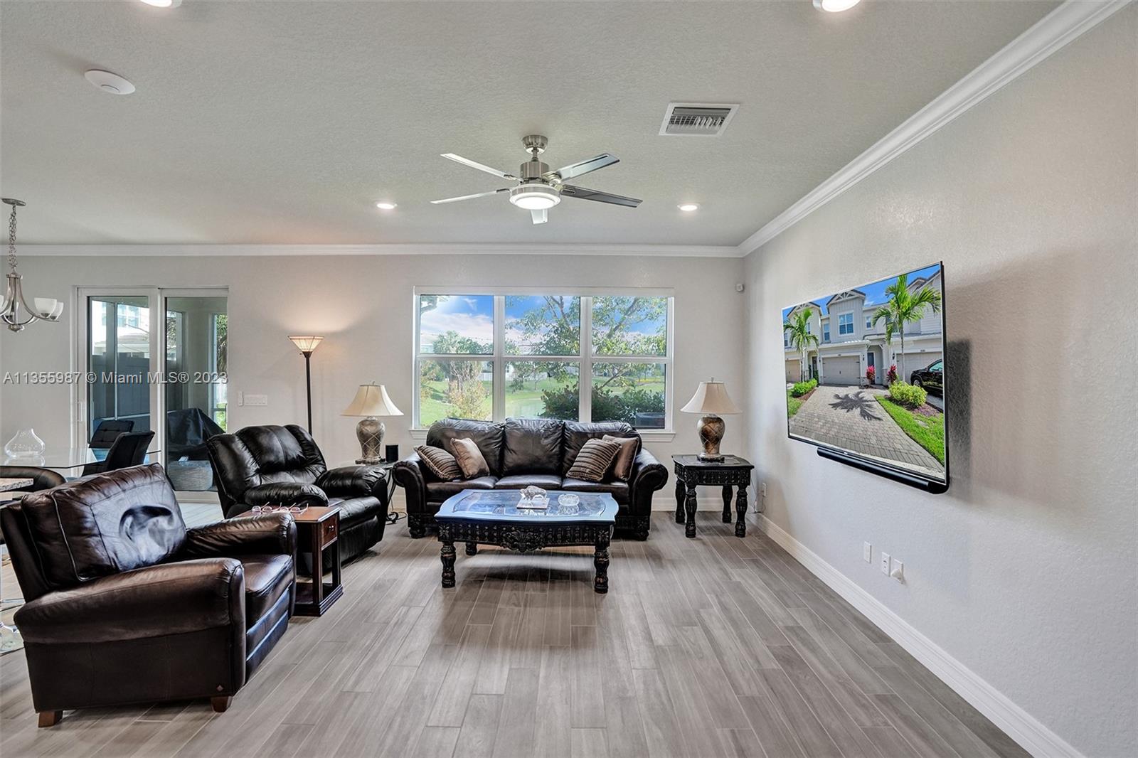 5055 Eucalyptus Drive Hollywood, FL 33021 - Photo 5 of 50 a living room with furniture and a large window