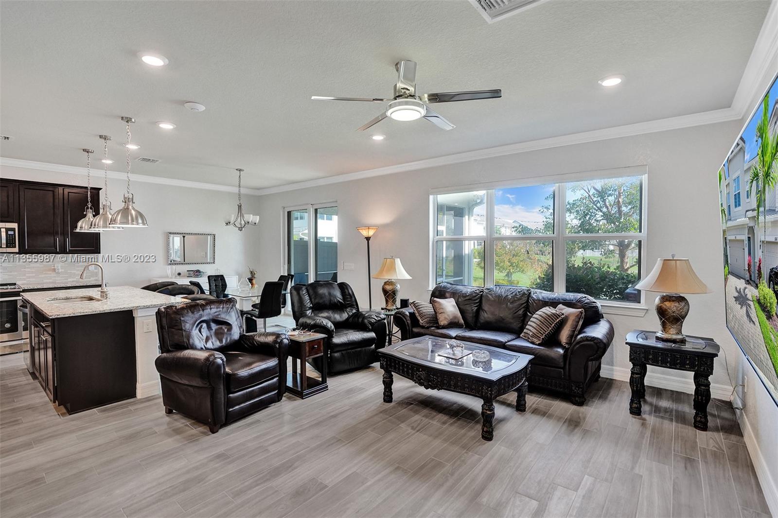 5055 Eucalyptus Drive Hollywood, FL 33021 - Photo 6 of 50 a living room with furniture and a large window