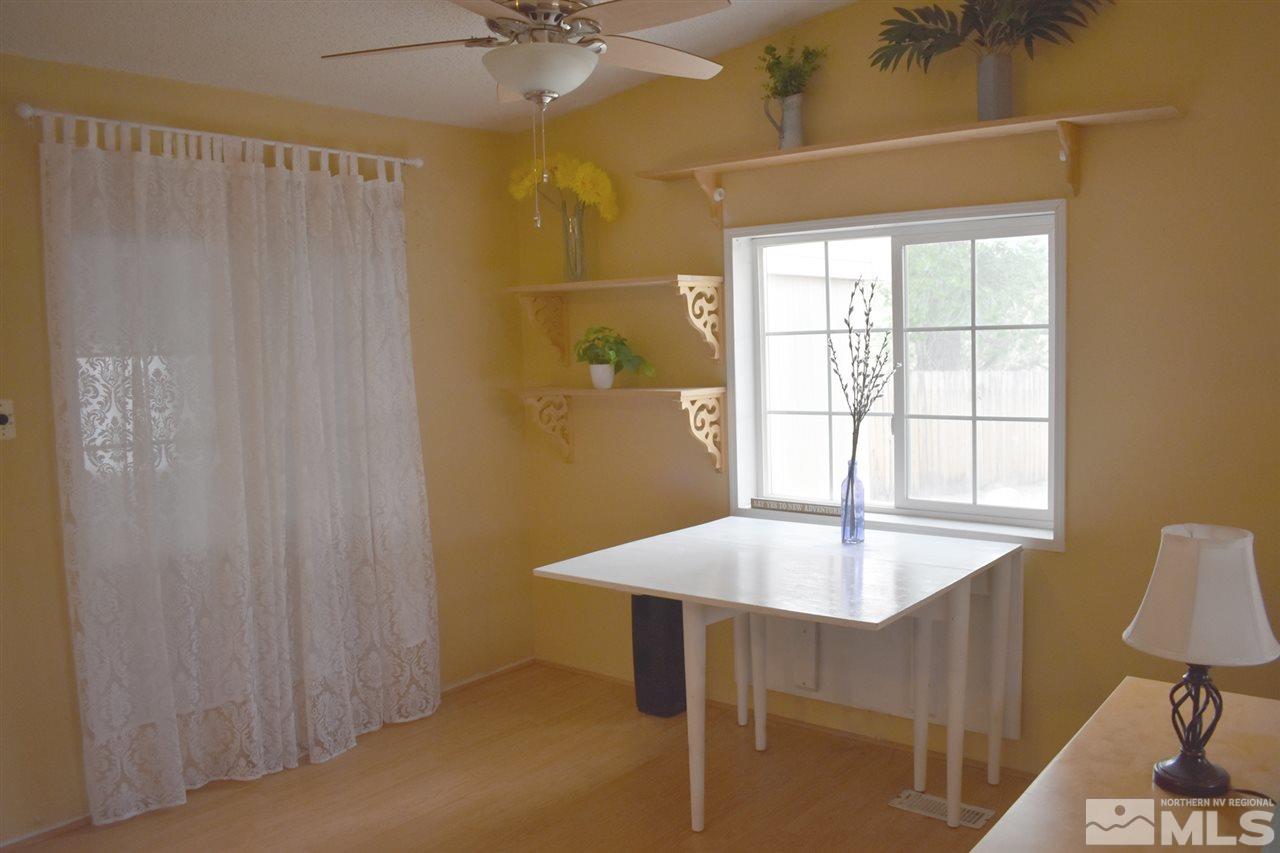 260 Zircon Drive Reno, NV 89521 - Photo 5 of 17 a workspace with furniture and window
