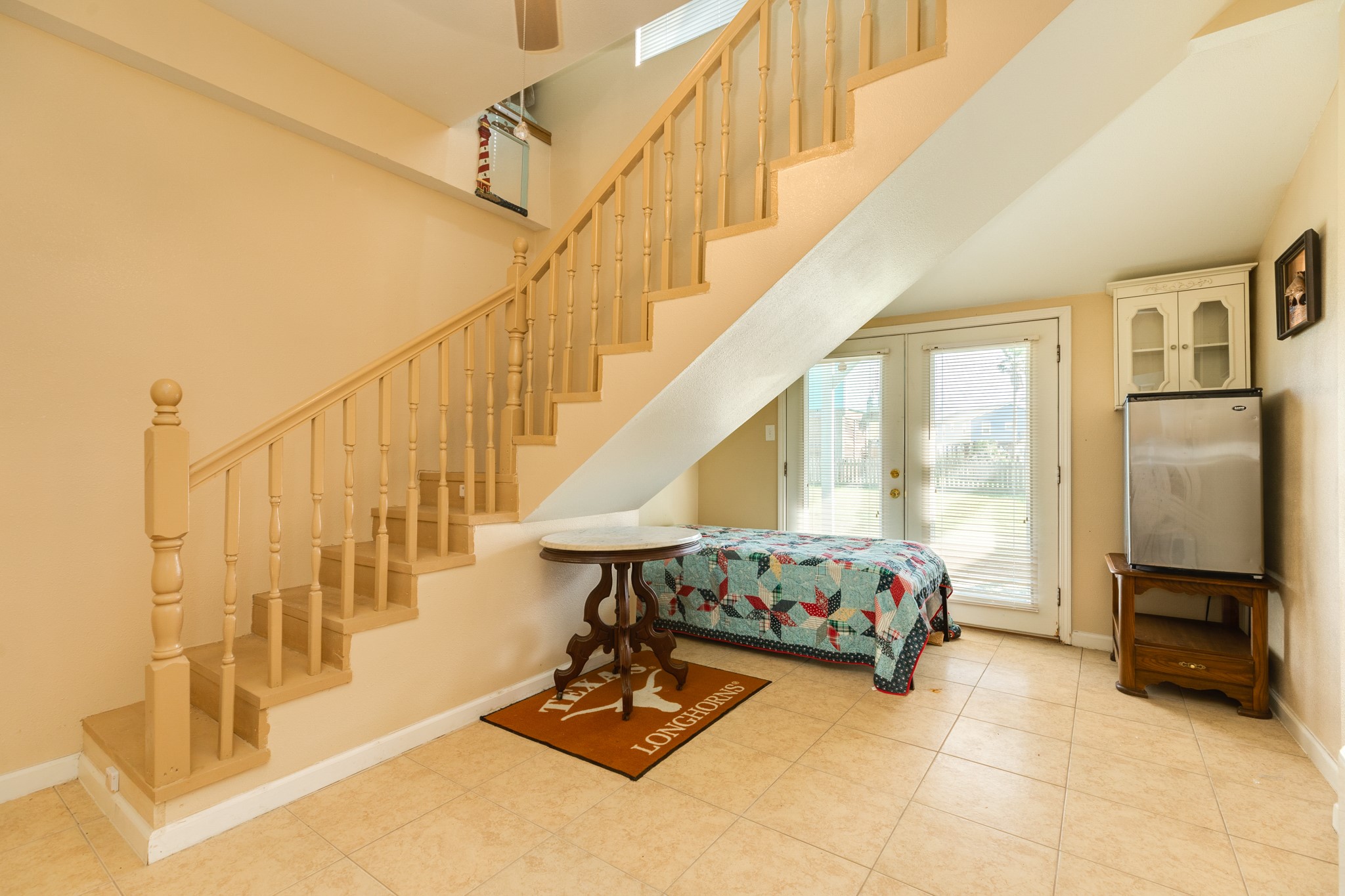 131 Point Lafitte Court Surfside Beach, TX 77541 - Photo 23 of 28 a room with lots of furniture and wooden floor
