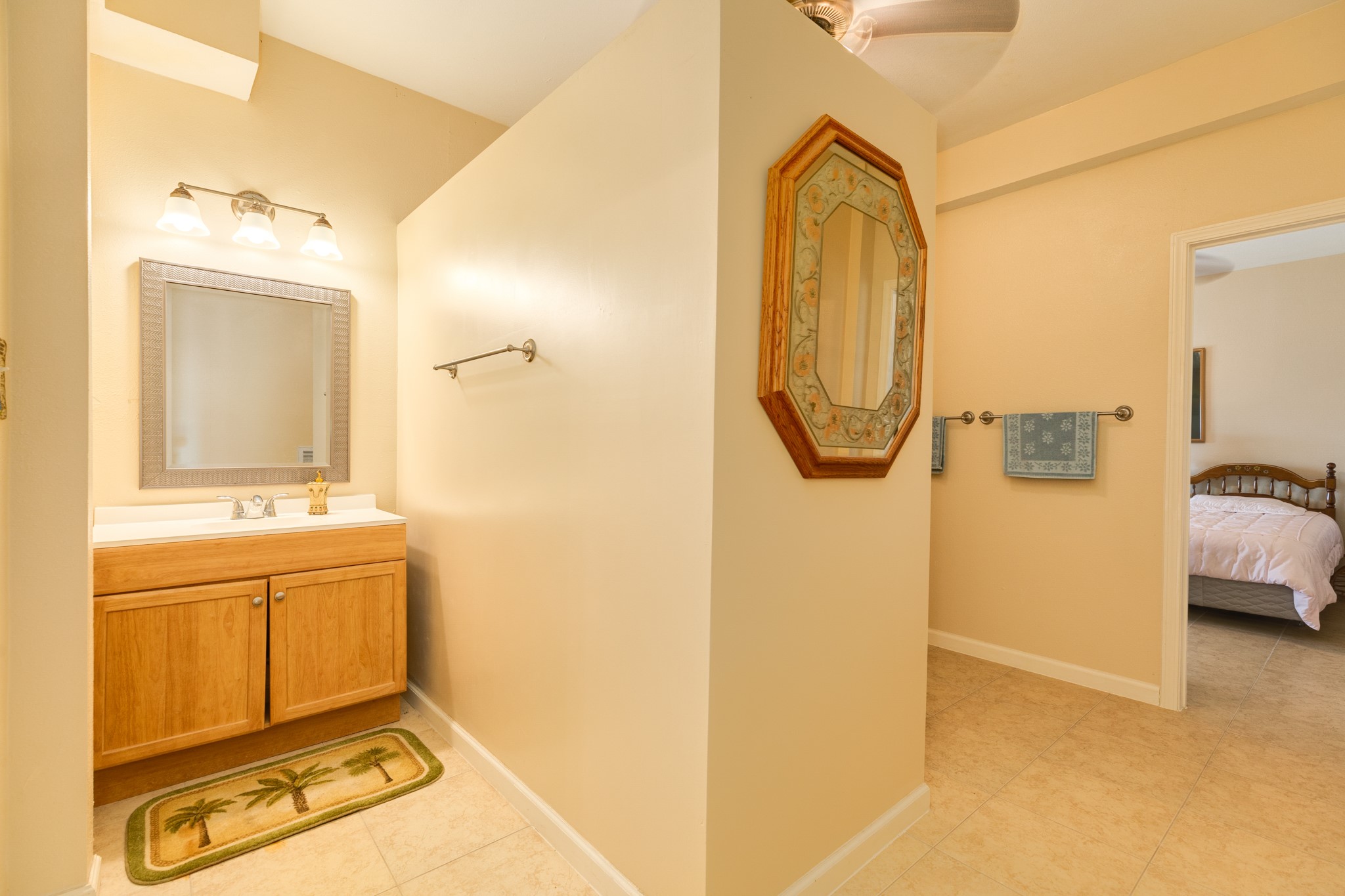 131 Point Lafitte Court Surfside Beach, TX 77541 - Photo 25 of 28 a bathroom with a tub sink and mirror