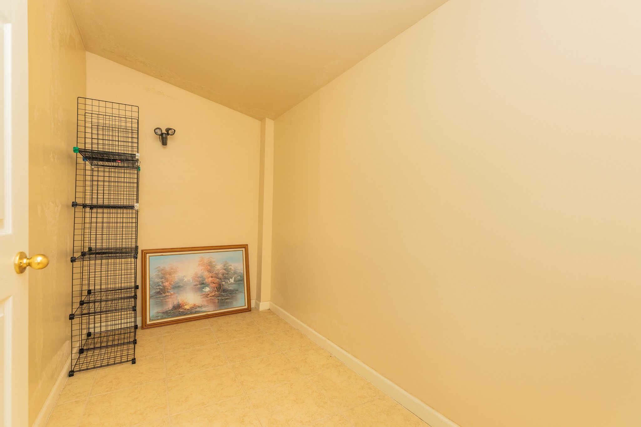 131 Point Lafitte Court Surfside Beach, TX 77541 - Photo 27 of 28 a view of a room with a door