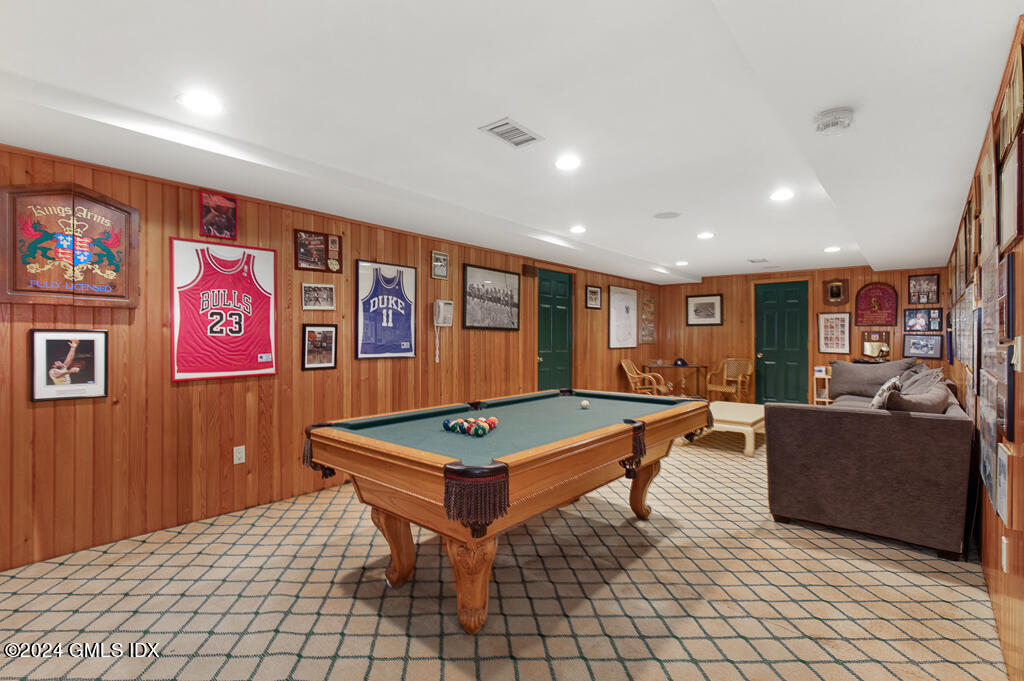 158 Clapboard Ridge Road Greenwich, CT 06831 - Photo 31 of 41 a living room with furniture a table and white walls