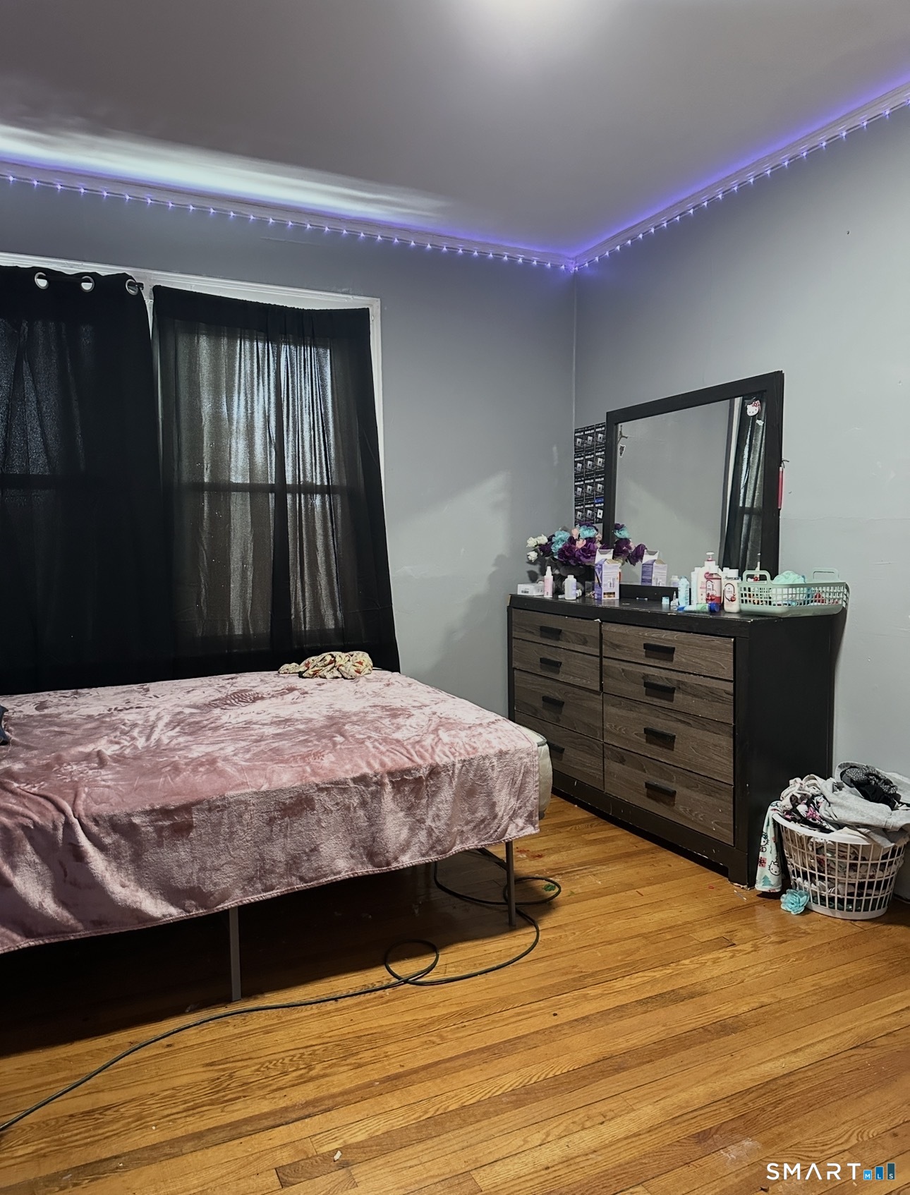 165 Martin Street Hartford, CT 06120 - Photo 5 of 8 a bedroom with a bed and a dresser