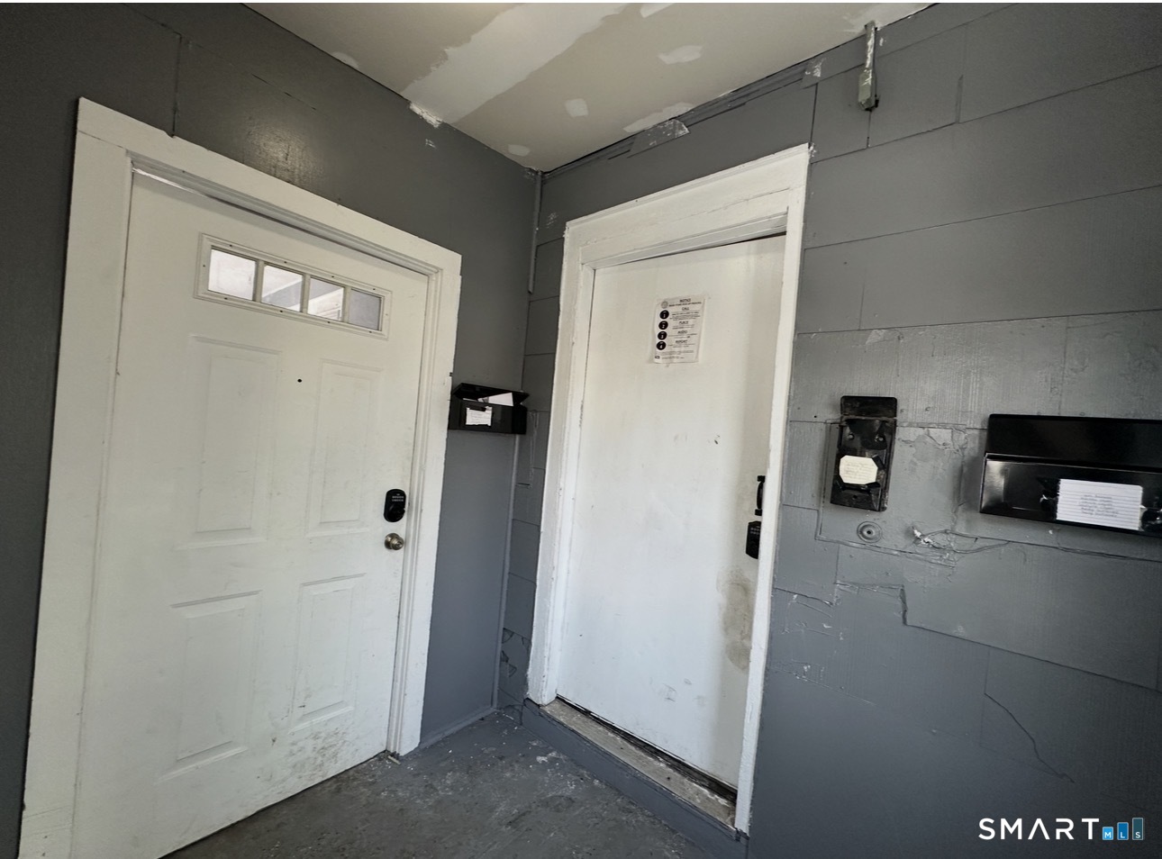165 Martin Street Hartford, CT 06120 - Photo 7 of 8 a view of a hallway to rooms