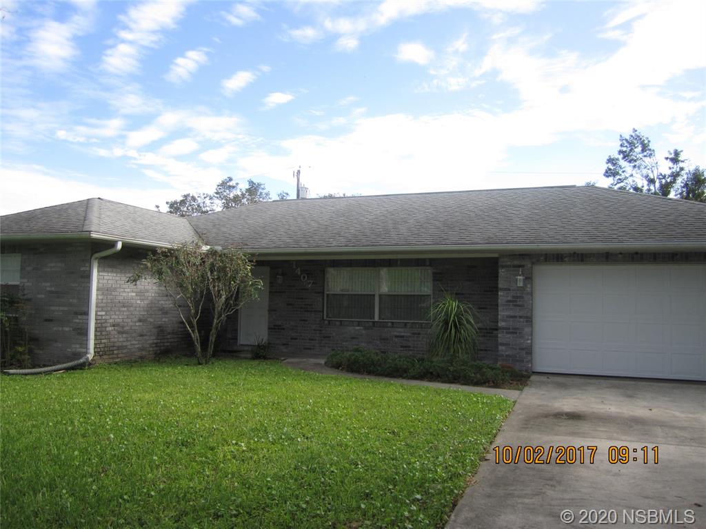 1407 Orange Tree Drive Edgewater, FL 32132 - Photo 1 of 1 a view of a backyard