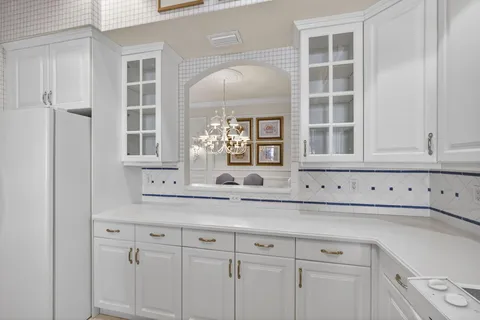 a bedroom with a bed and a table in it