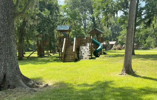 a view of a swimming pool with an outdoor space and seating area