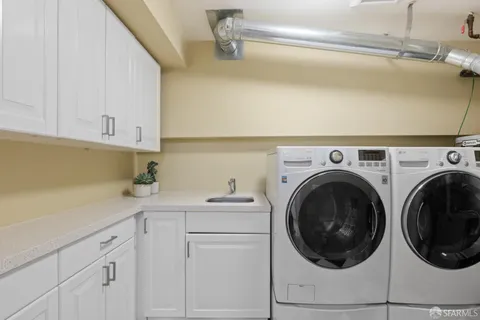 a bedroom with a large bed and a large window