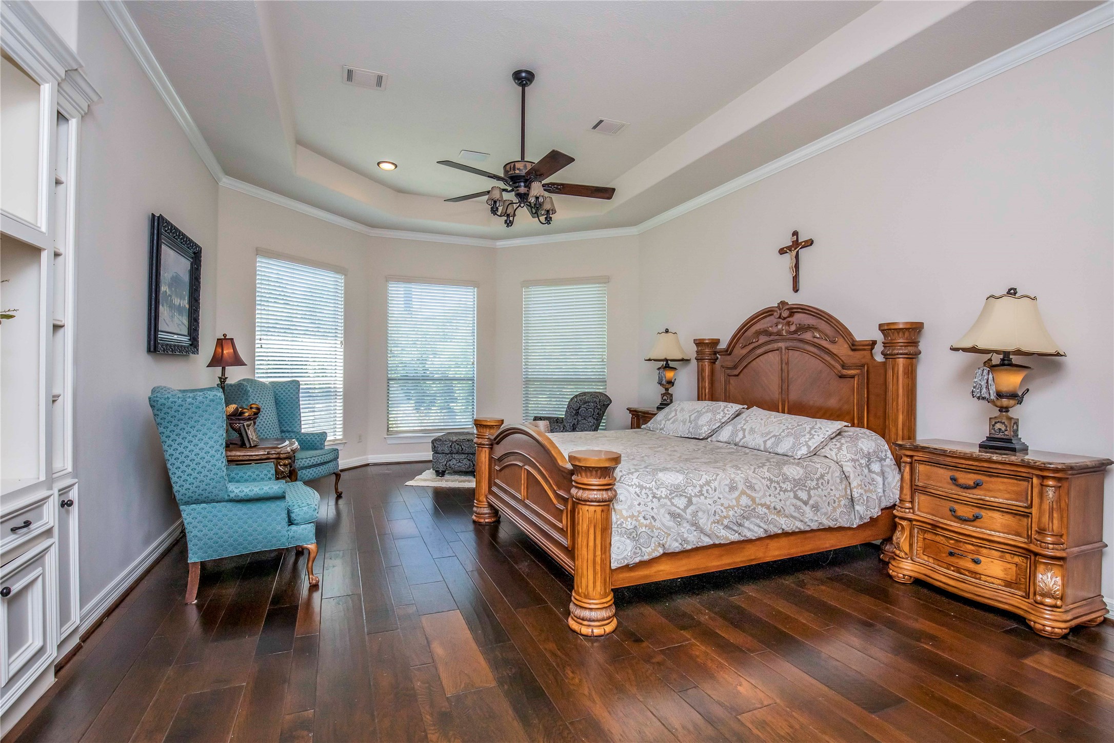 25219 Hideaway Run Drive Spring, TX 77389 - Photo 27 of 45 a bedroom with a bed and wooden floor
