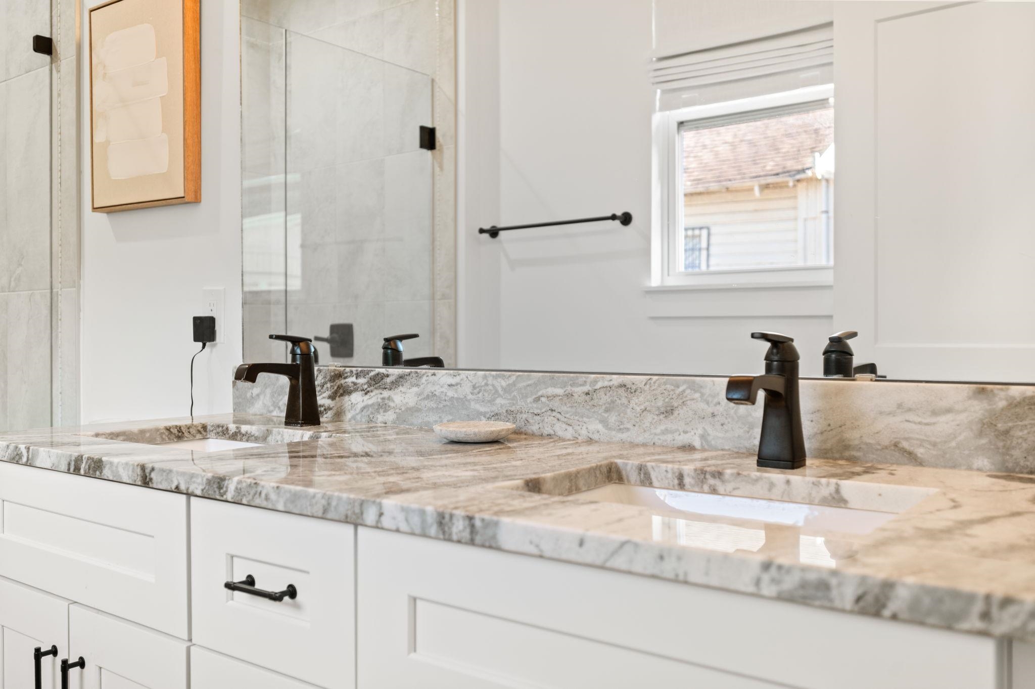 135 Blanco Street St. Augustine, FL 32084 - Photo 21 of 35 a bathroom with sinks granite and a vanity