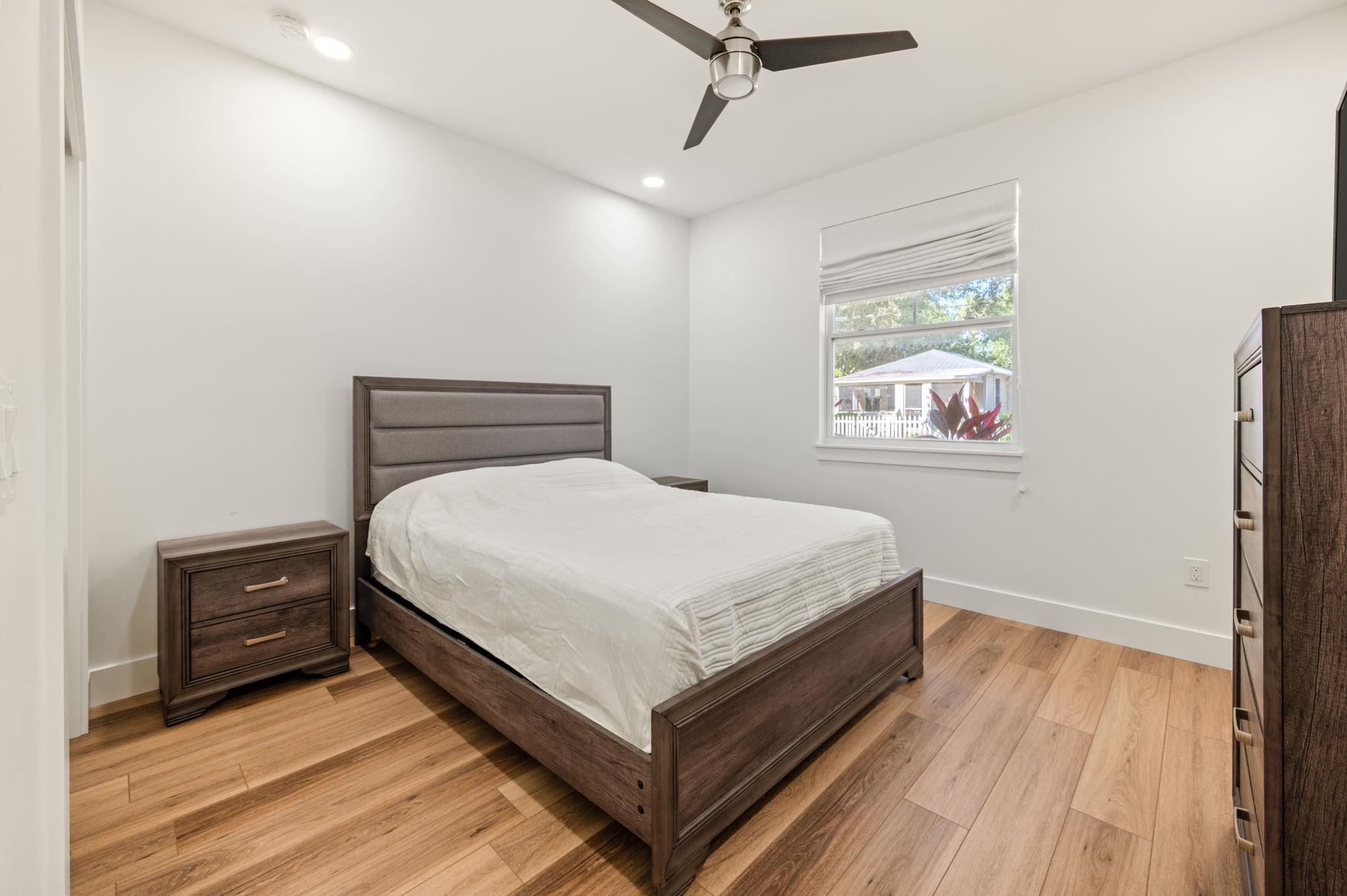 135 Blanco Street St. Augustine, FL 32084 - Photo 24 of 35 a bedroom with a bed and a window