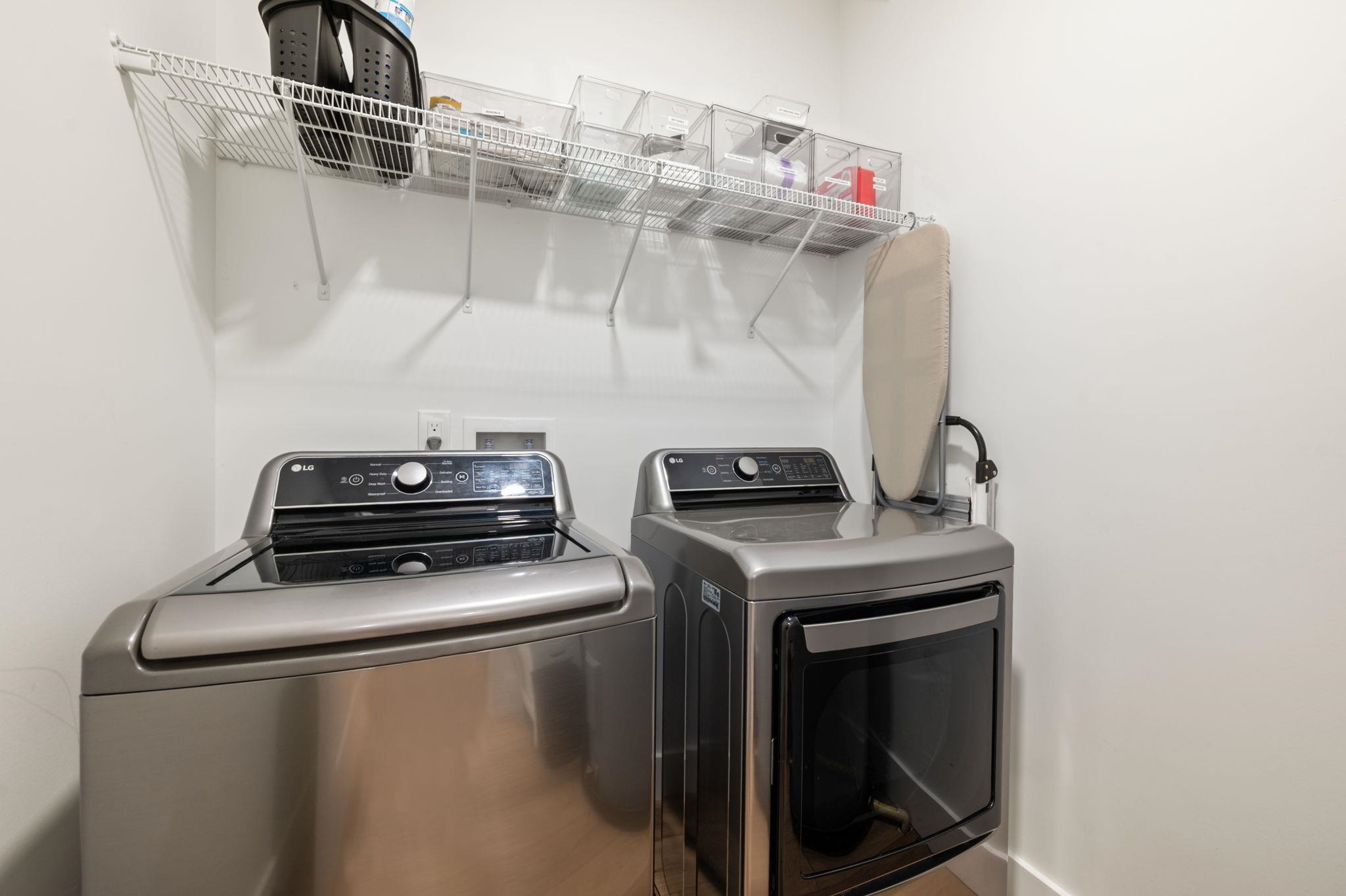 135 Blanco Street St. Augustine, FL 32084 - Photo 29 of 35 a view of storage and utility room with washer and dryer